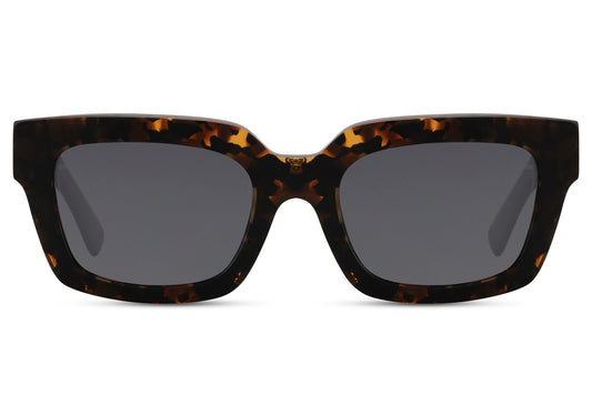 Introducing the Black Animal Print Wayfarer Sunglasses from our newly launched eyewear collection, designed to provide both style and eye protection. Featuring a bold black animal print frame, these sunglasses are crafted from high-quality acetate for durability and comfort. The polarized lenses reduce glare and enhance clarity, while providing 100% UV protection to keep your eyes safe from harmful rays.