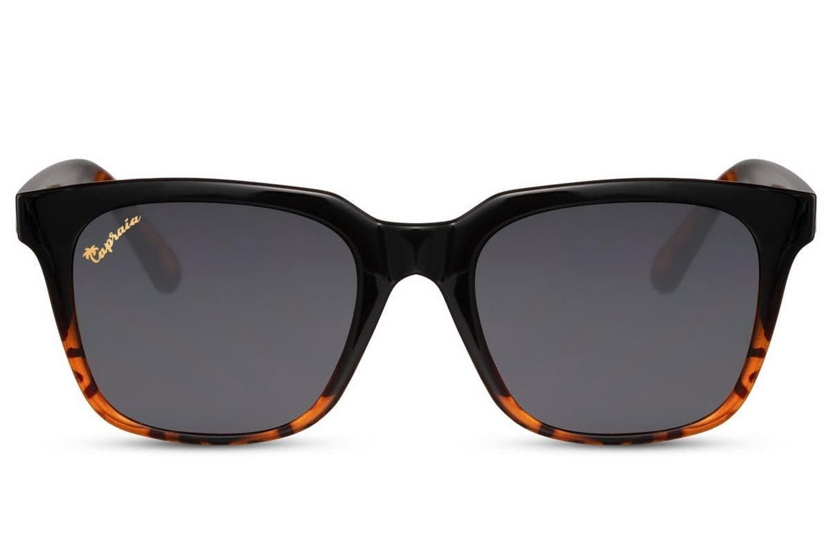 Introducing our Black Animal Print Wayfarer Sunglasses, the perfect fusion of classic design and bold fashion. Recently launched as part of our exclusive collection, these sunglasses are crafted from high-quality synthetic material, offering durability and comfort. The striking black animal print pattern on the frame adds a unique edge to the iconic wayfarer shape, making these sunglasses a must-have accessory for fashion-conscious individuals.