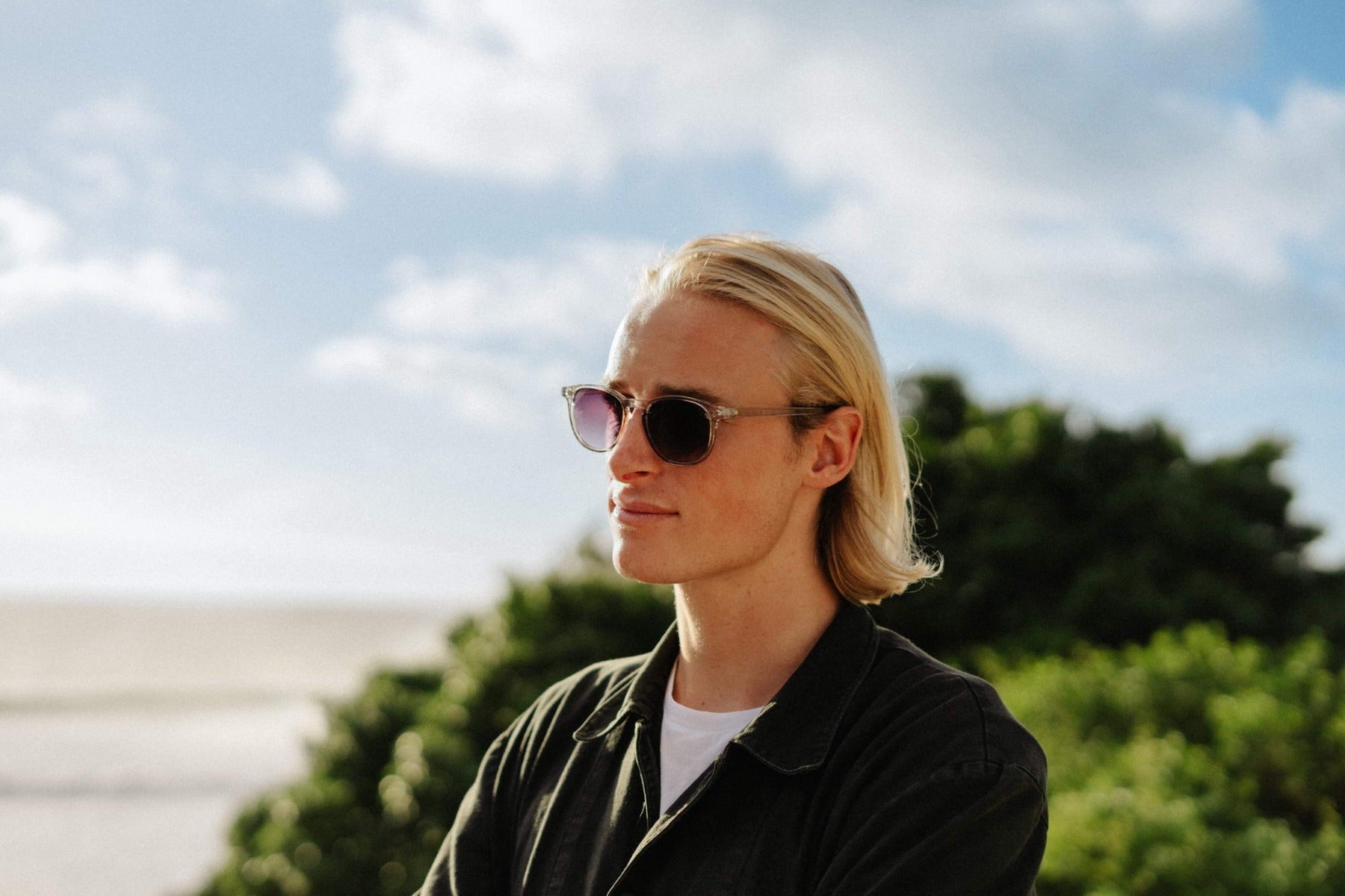 Women wearing Amsterdam round sunglasses polycarbonate frame UV400 protection Dutch inspired retro minimalist summer city outdoor beach holiday festival eyewear free UK Europe shipping Sunglass Station