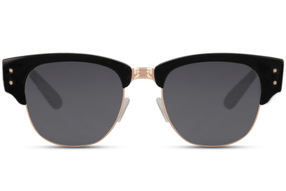 A pair of Clubmaster sunglasses with a metal frame and polycarbonate lenses, featuring a clubmaster style