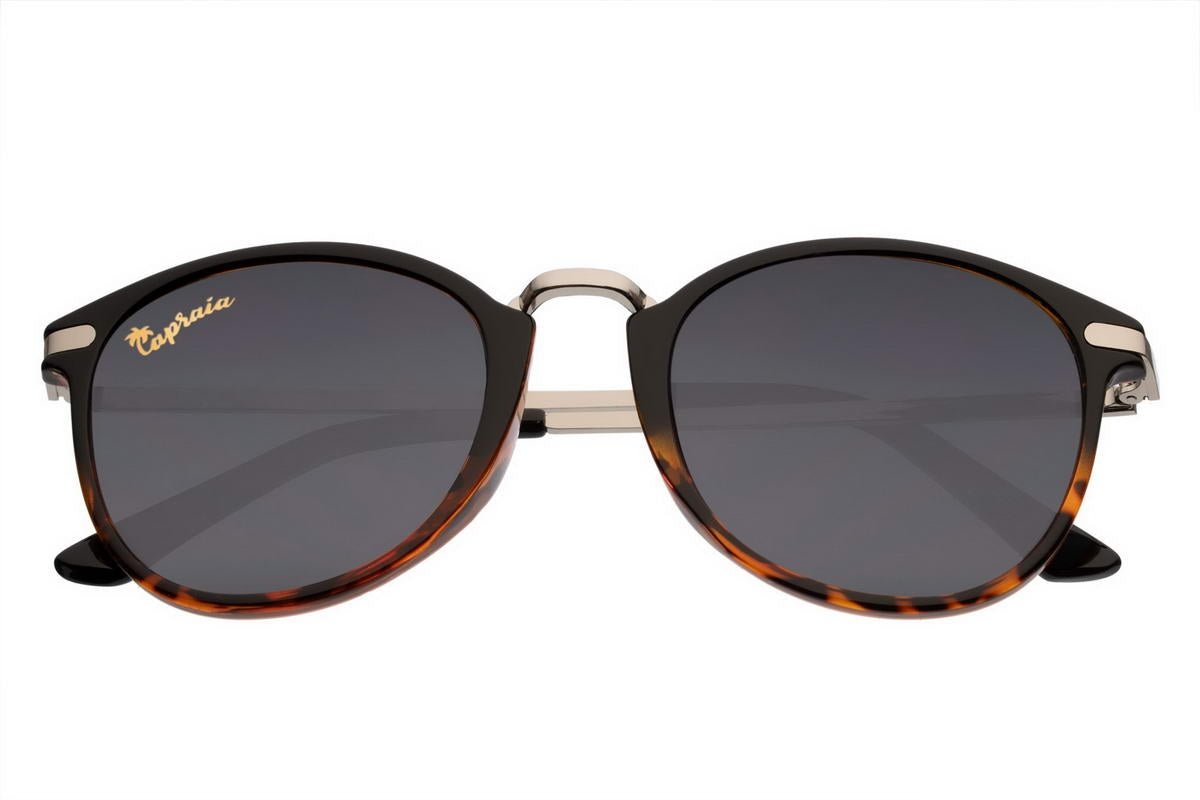 Make a statement with these Black Round Sunglasses, featuring a striking animal print frame and sleek black lenses. Designed to combine style and functionality, these sunglasses are perfect for everyday wear or special occasions.
