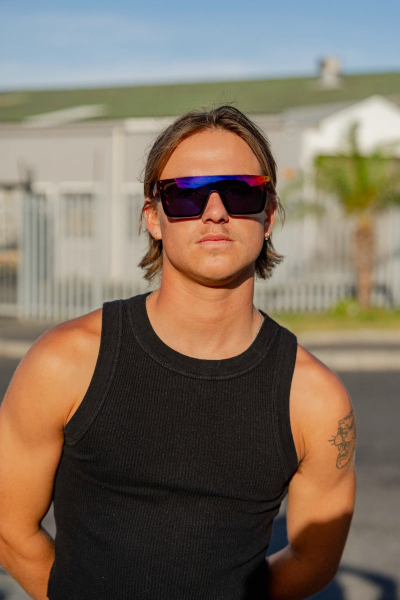 man in madrid wearing sports sunglasses