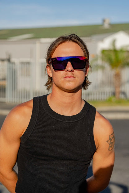 man in madrid wearing sports sunglasses