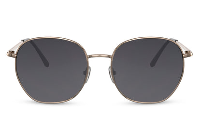 Classic geometric round sunglasses gold metal frame black smoke 100% recycled lens UV400 protection men women timeless elegant retro angular everyday city summer beach driving free UK Europe delivery Sunglass Station