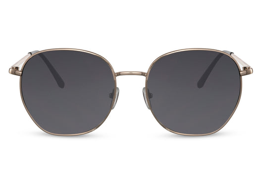 Classic geometric round sunglasses gold metal frame black smoke 100% recycled lens UV400 protection men women timeless elegant retro angular everyday city summer beach driving free UK Europe delivery Sunglass Station
