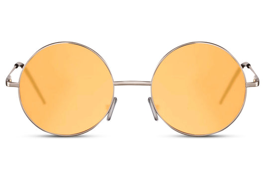 Coloured lens round sunglasses gold metal frame orange amber translucent 100% recycled lens UV400 protection men women bold retro festival summer beach city eyewear free UK Europe delivery Sunglass Station
