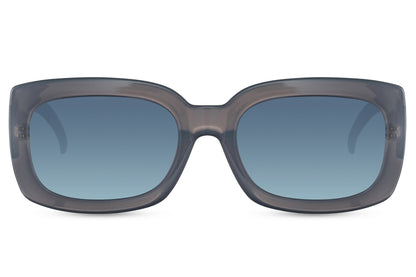 blue frame eco bold rectangle party sunglasses with blue gradient lens — the chromatic colourway that carried the European blue lens trend into its most accessible sustainable form, UV400 recycled polyester | Sunglass Station