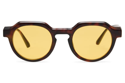 Eco chunky round geometric sunglasses black recycled frame yellow translucent polycarbonate lens UV protection men women bold statement retro festival summer eyewear free UK Europe delivery Sunglass Station