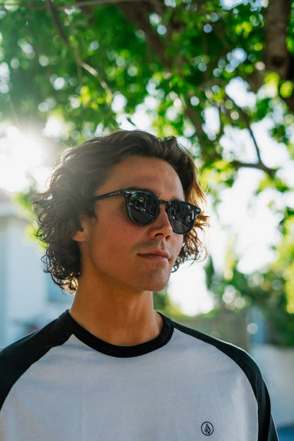 Men wearing eco Milan round sunglasses recycled polyester frame UV400 protection sustainable Italian inspired bold retro city outdoor summer beach holiday festival eyewear free UK Europe shipping Sunglass Station