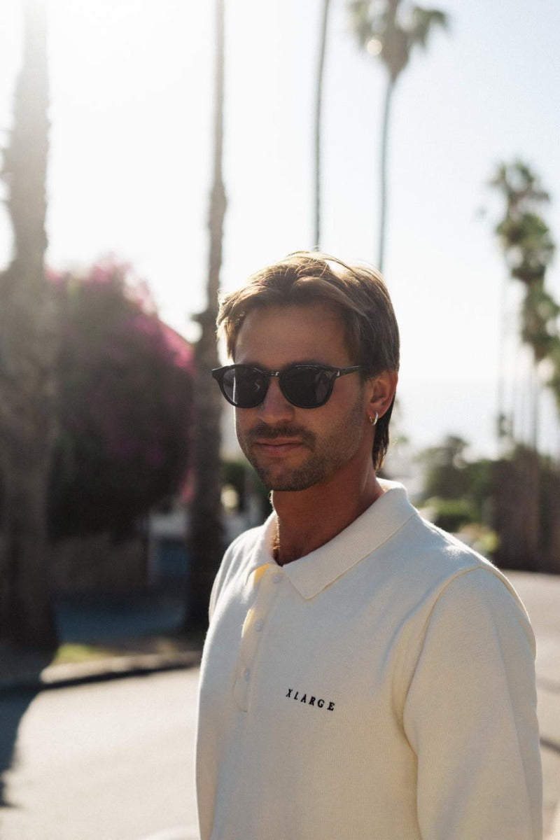 Men wearing eco Spain classic round sunglasses recycled polyester frame UV400 protection sustainable Spanish Mediterranean inspired summer city outdoor beach holiday festival eyewear free UK Europe shipping Sunglass Station