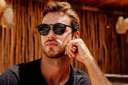 Men wearing Greece round sunglasses black polycarbonate frame green lens UV400 protection retro Mediterranean Greek inspired summer city outdoor beach holiday festival eyewear free UK Europe shipping Sunglass Station