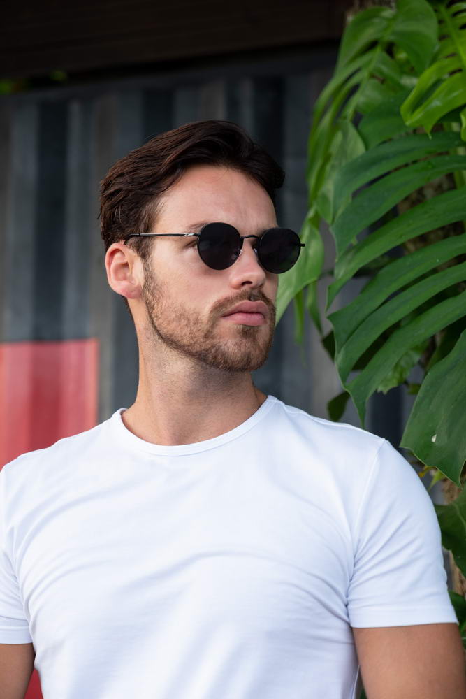 Men wearing Ibiza metal round festival sunglasses black metal frame smoke lens UV400 protection bold retro Ibiza summer city outdoor beach holiday festival eyewear free UK Europe shipping Sunglass Station