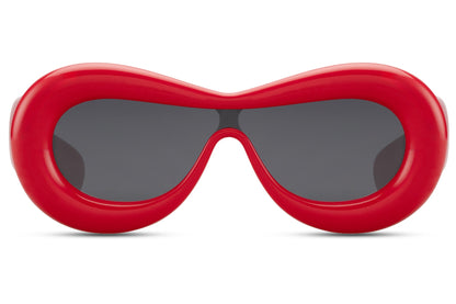 Red inflated oval Ibiza party shades in 100% recycled polyester — maximum chromatic impact in the bubble frame silhouette, the red statement piece for women who own every room from a Saint-Tropez terrace to a festival main stage, UV400