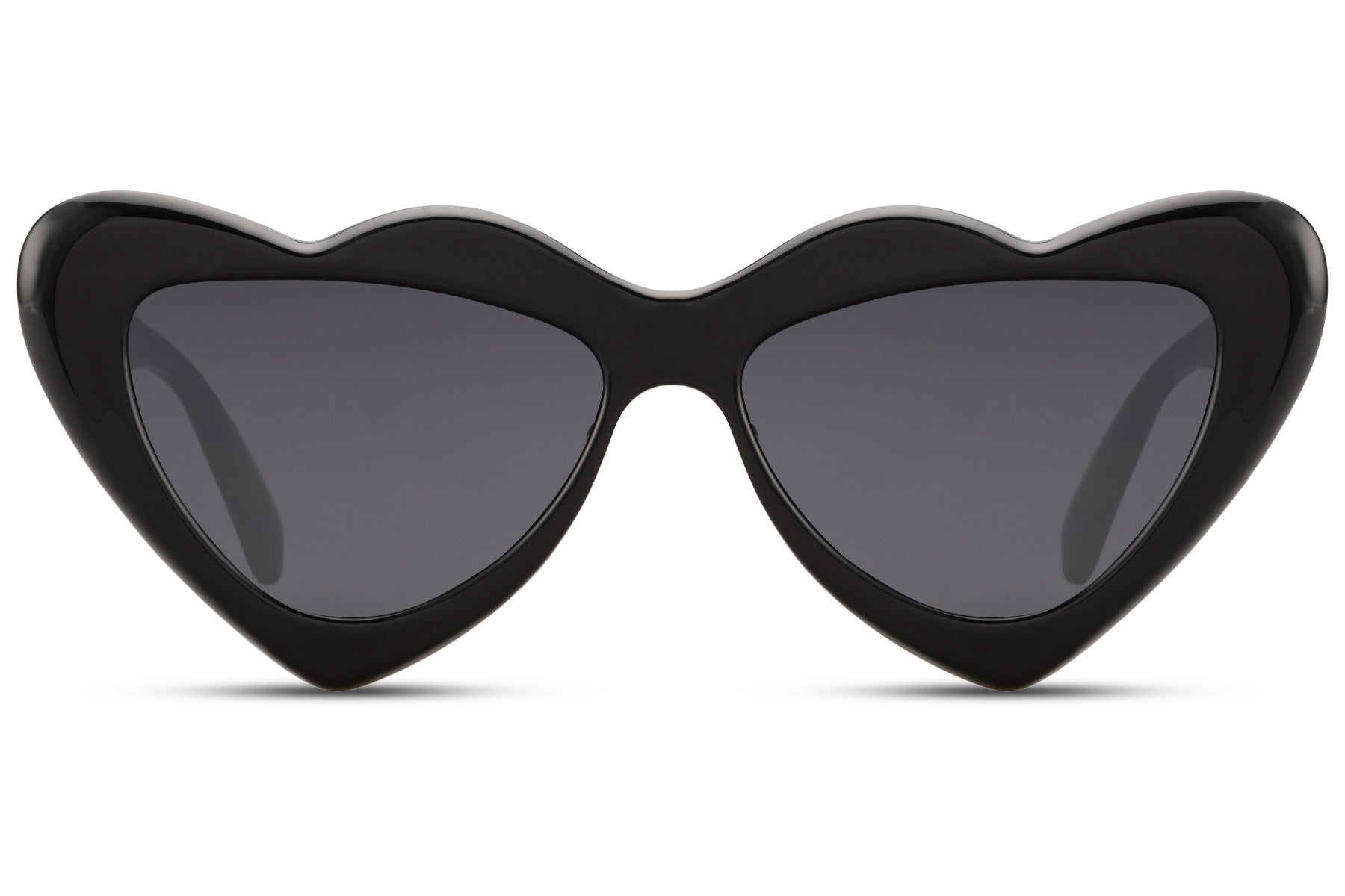 Wide angle of black luxe heart party sunglasses — bold heart-shaped cat-eye in sustainable recycled polyester, the statement frame for festival season, rooftop parties and anywhere that rewards dressing with intention, free delivery UK & Europe