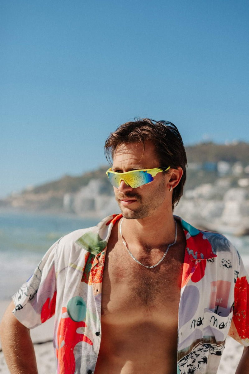 man wearing sharp edges visor style sunglass at athens beach