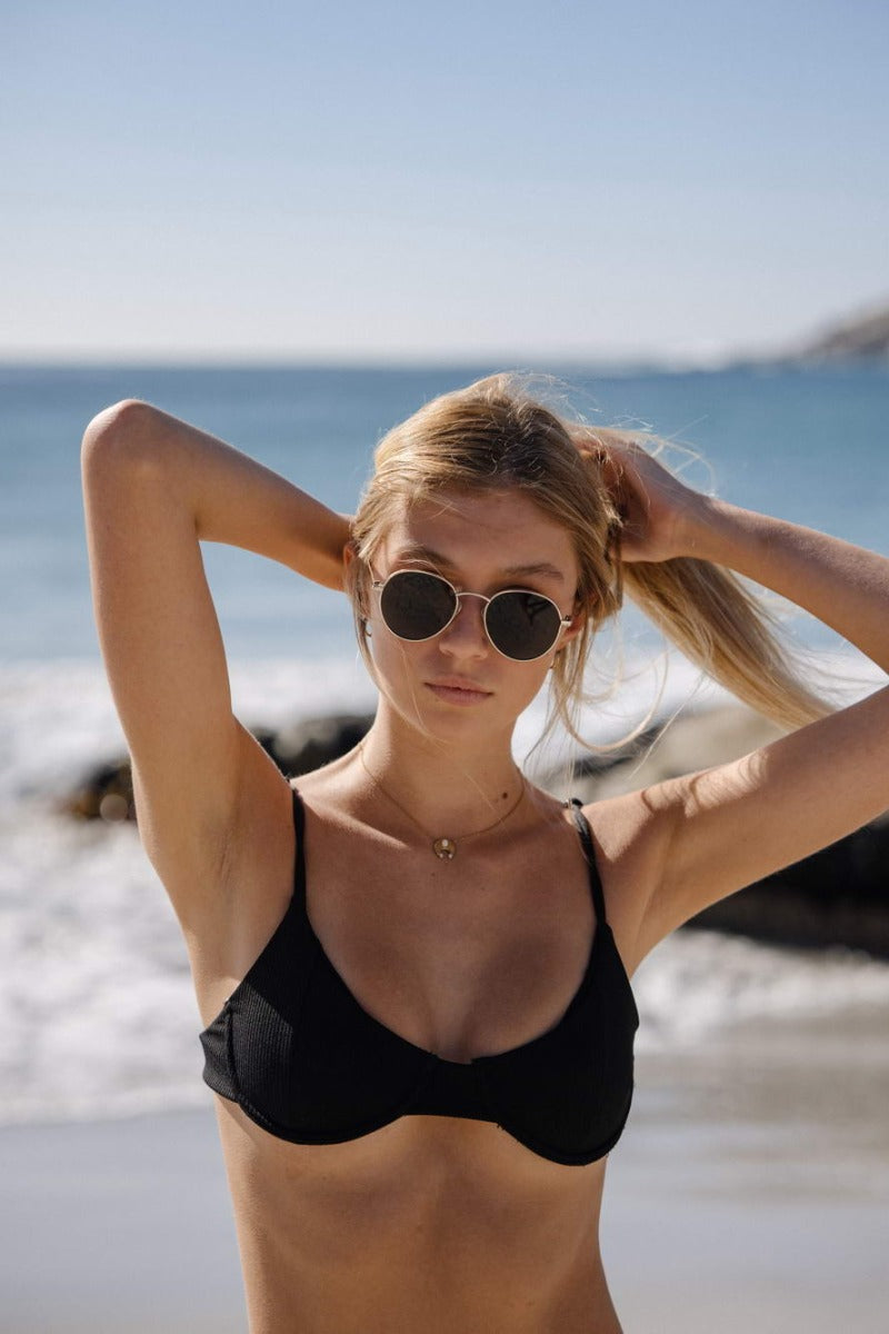 Women wearing metal frame round sunglasses gold frame UV400 protection flexible lightweight all-day sun protection summer beach holiday city casual outfit free UK Europe shipping Sunglass Station