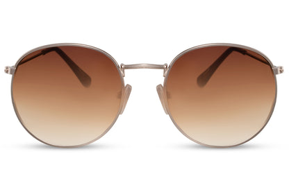 Milan retro round sunglasses gold slim metal frame brown gradient lens side view lightweight slim arms UV400 protection comfortable all-day wear free UK Europe shipping Sunglass Station