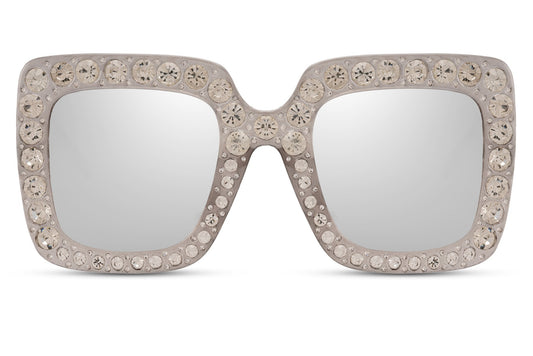 A pair of mirrored sunglasses with a diamond detail frame, the lenses are reflecting light, and the frame appears to be brown and grey.