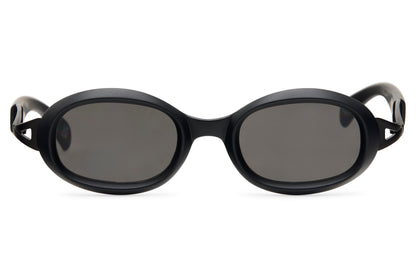 Black bold oval party sunglasses with sculptural temple detail — architectural unisex eyewear where fashion and function meet, 100% recycled polycarbonate, UV400 protection
