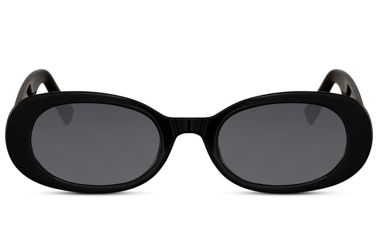Oval trendy sunglasses for women with black polycarbonate frame and smoke grey UV protection lens – bold minimalist retro round shades for everyday city wear and street style, free delivery across UK and Europe from Sunglass Station