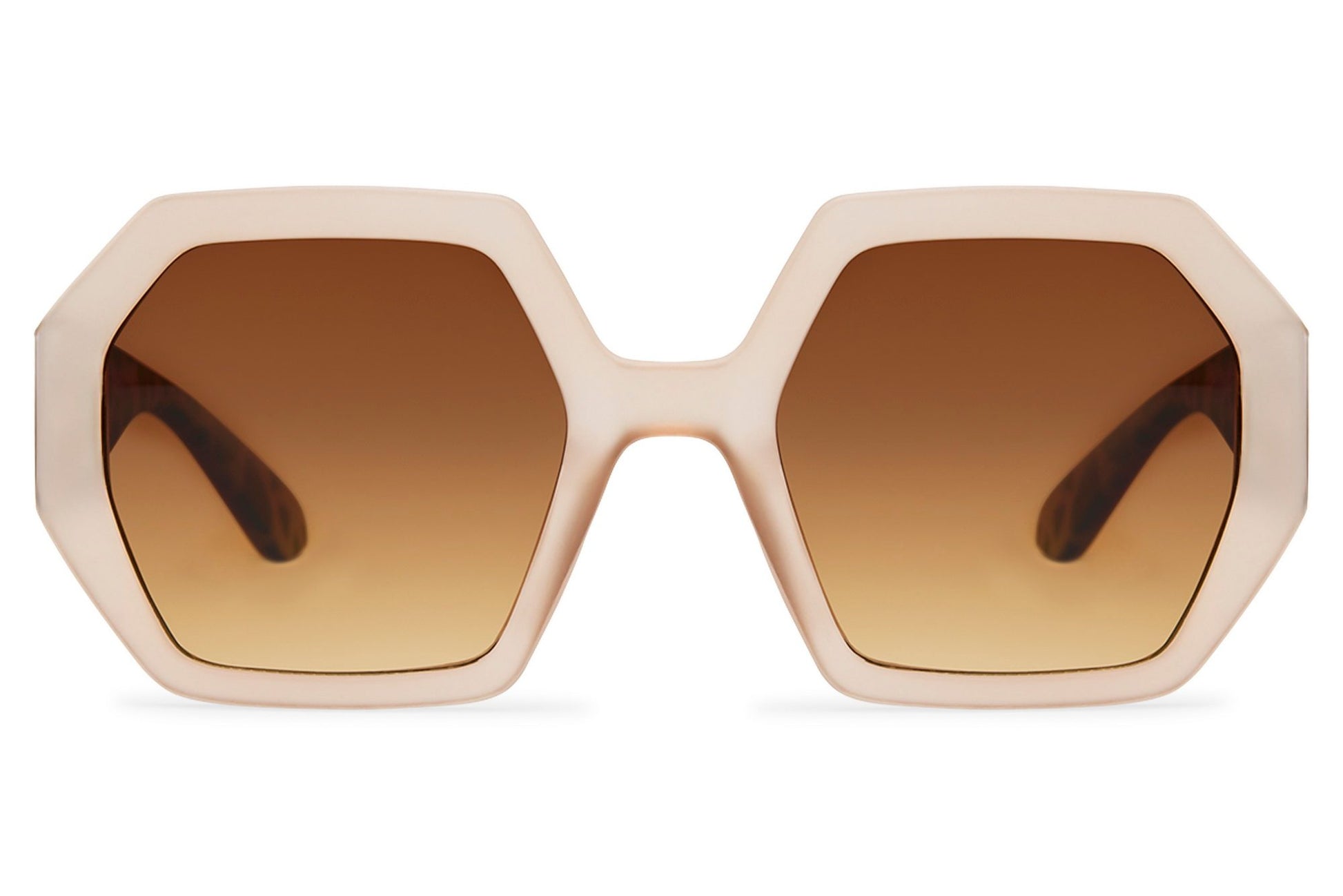Cream and brown two-tone oversized geometric party sunglasses with warm brown lens — tonal quiet luxury in a bold hexagonal frame, the softer maximalism for women who want presence without noise, free delivery UK & Europe