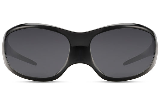 Black oversized Y2K party sunglasses with 8cm wide lens — the largest lens coverage in the collection, bold wraparound polycarbonate build for men and women who dress without limits, UV400 certified