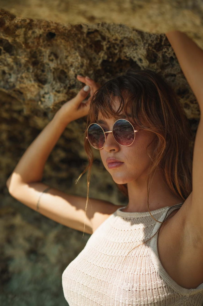 Women wearing Paris tinted lens round sunglasses gold metal frame UV400 protection elegant Paris chic retro summer outdoor city festival beach holiday eyewear free UK Europe shipping Sunglass Station