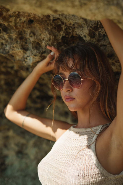 Women wearing Paris tinted lens round sunglasses gold metal frame UV400 protection elegant Paris chic retro summer outdoor city festival beach holiday eyewear free UK Europe shipping Sunglass Station