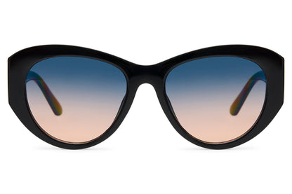 Oversized black cat-eye party sunglasses with blue to peach gradient translucent lens — old Hollywood glamour reframed for 2026, the statement silhouette for women who dress like the occasion matters, UV400 protection