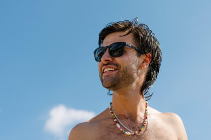 man wearing rome trending sunglasses with pitch black frame provides uv400 protection