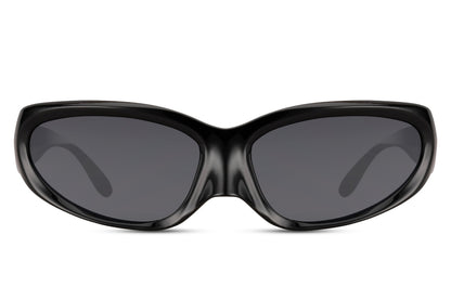 Black polarized visor party sunglasses with dark smoke lens — where sport meets street, the wide-coverage frame that belongs equally on a Berlin club terrace and a coastal cycle path, UV400 protection