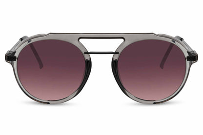 Retro round sunglasses grey black metal polycarbonate frame pink gradient lens durable 100% UV400 protection women travel-ready bold retro glamorous summer city beach free UK Europe delivery Sunglass Station