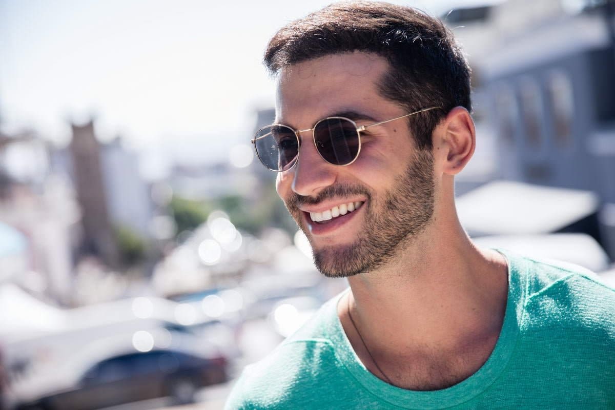 Men wearing Rome gold black round sunglasses gold black metal frame deep black lens UV400 protection bold sophisticated Italian inspired summer city outdoor beach holiday festival free UK Europe delivery Sunglass Station