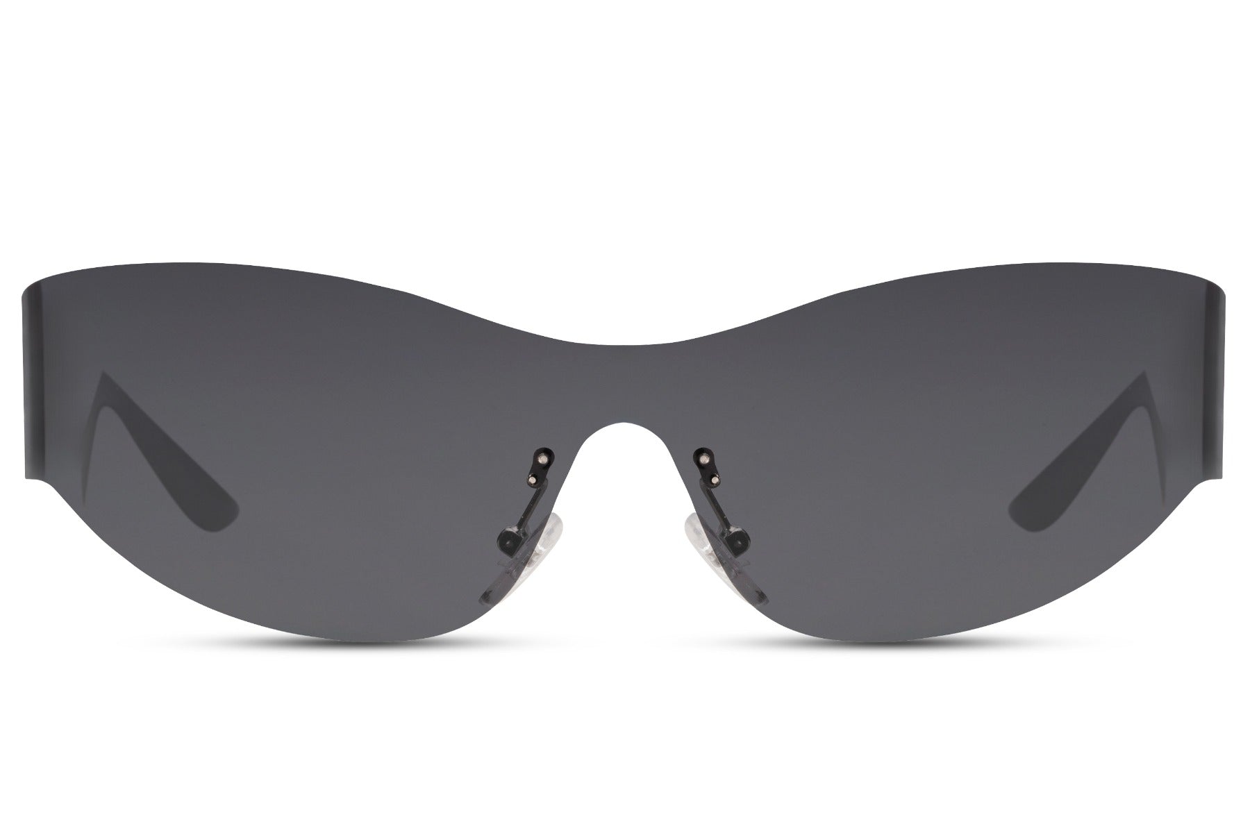 Silver mirror visor sunglasses from a lower angle — the rimless silhouette that appeared on SS26 runways from Milan to Copenhagen and landed on festival fields from Glastonbury to Sonar | Sunglass Station