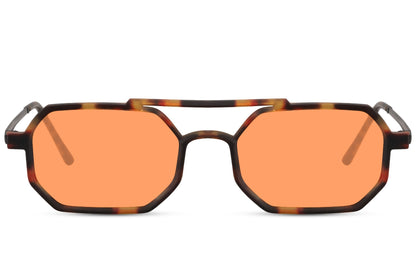 Tortoiseshell metal frame sleek geometric party sunglasses with orange translucent lens — flat-top editorial silhouette in lightweight metal, the warm chromatic lens pairing that belongs on a Copenhagen street style edit or an Ibiza rooftop, UV400