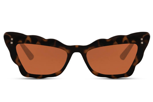 Brown tortoiseshell statement cat-eye party sunglasses with gold frame — old-money Riviera glamour in 100% recycled polyester, translucent lens, UV400