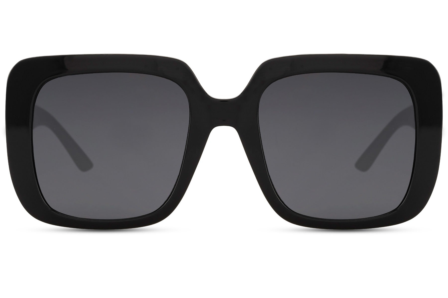 Barcelona oversized sunglasses with bold black frame and dark lenses, statement women sunglasses inspired by Mediterranean summer style, perfect for beach days, holidays and sunny city walks