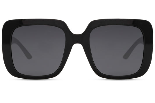 Barcelona oversized sunglasses with bold black frame and dark lenses, statement women sunglasses inspired by Mediterranean summer style, perfect for beach days, holidays and sunny city walks