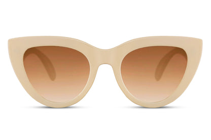 Vintage-inspired cat eye sunglasses with soft beige frame and tinted lenses, offering a refined retro aesthetic for everyday wear