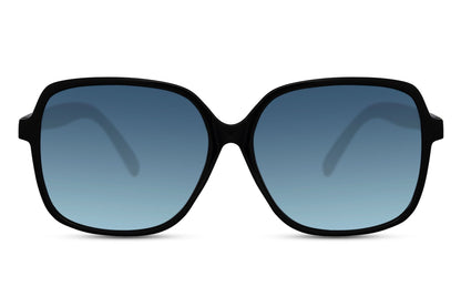 Oversized sunglasses with blue lenses and modern frame, stylish women sunglasses for travel, beach days and casual fashion looks