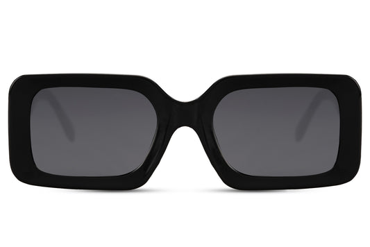 Bold oversized rectangle sunglasses with black frame and dark lenses by Sunglass Station, unisex eyewear with a strong statement design and UV protection, available online with free shipping across the UK and Europe