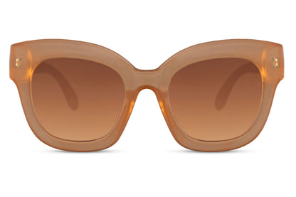 Brown cat eye sunglasses with tinted lenses and oversized frame design