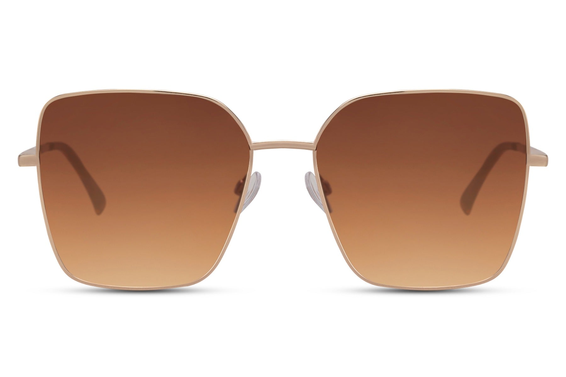 Brown oversized sunglasses with gold metal frame and tinted lenses, eco friendly sunglasses for women perfect for summer outfits, beach holidays and everyday wear