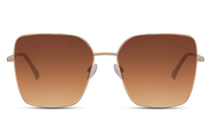 Brown oversized sunglasses with gold metal frame and tinted lenses, eco friendly sunglasses for women perfect for summer outfits, beach holidays and everyday wear