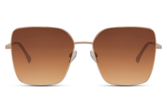 Brown oversized sunglasses with gold metal frame and tinted lenses, eco friendly sunglasses for women perfect for summer outfits, beach holidays and everyday wear