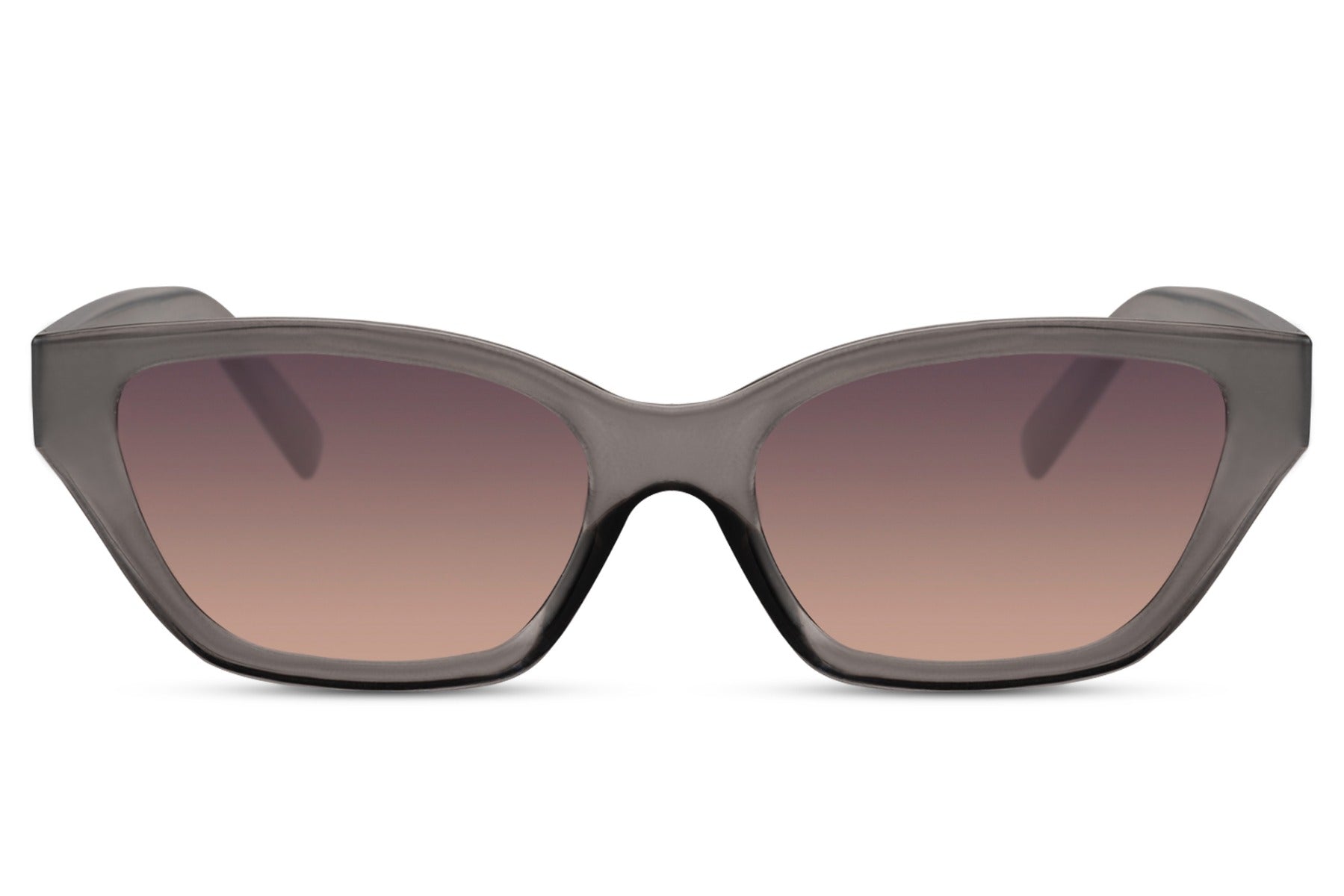 Subtle cat eye sunglasses with brown gradient lenses and refined frame, perfect for effortless styling and neutral-toned outfits