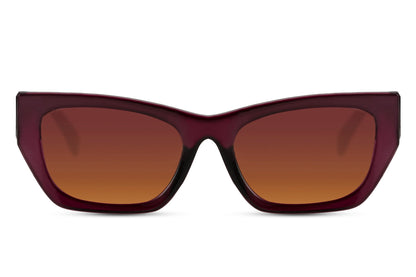 Cat eye sunglasses with brown gradient lenses and modern frame design