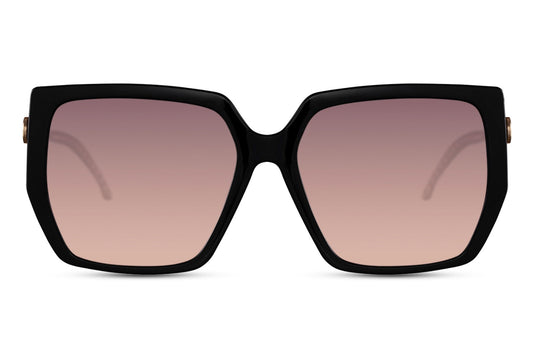 Geometric oversized sunglasses with black frame and pink gradient lenses, combining bold modern design with eco-friendly materials and UV protection