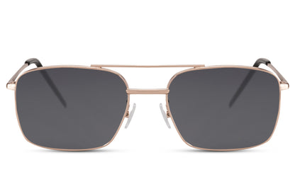 Metal frame rectangle sunglasses with gold frame and dark lenses by Sunglass Station, lightweight unisex eyewear with a sleek modern design and UV protection, available online with free shipping across the UK and Europe