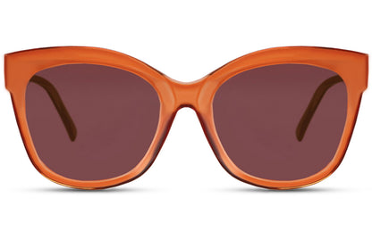 Orange cat eye sunglasses with bold oversized frame creating a standout fashion statement